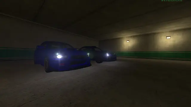 Blue car tucked away in the garage